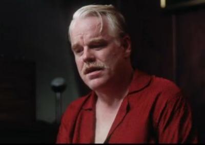 Hoffman as Lancaster Dodd, The Master